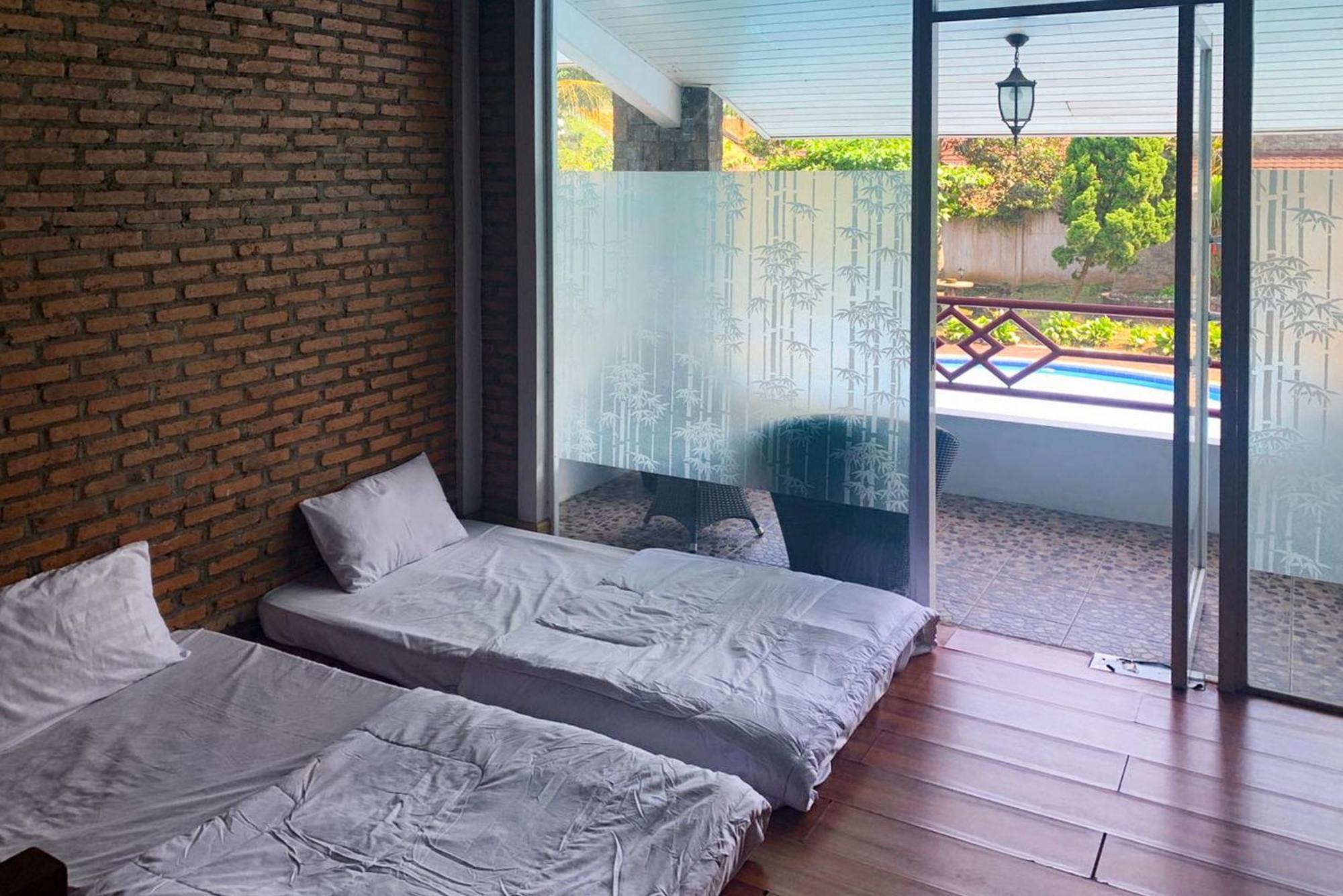 Urbanview Hotel Villa Q Gisting Bandjarnegeri Екстериор снимка